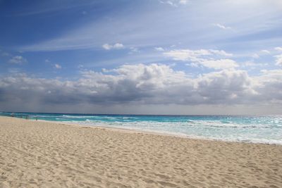 Scenic view of beach against sky