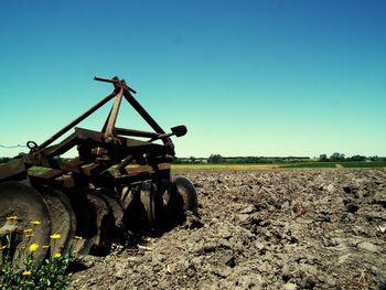 Agricultural field against clear sky