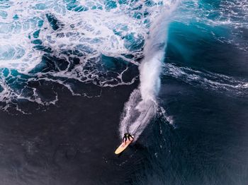 High angle view of person surfing in sea