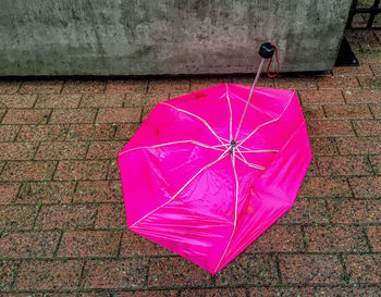 High angle view of umbrella on wall