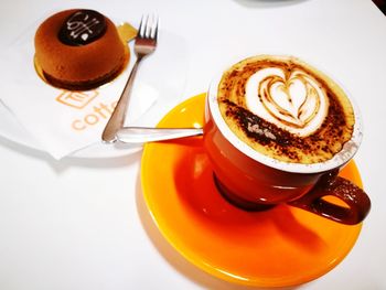 High angle view of cappuccino on table