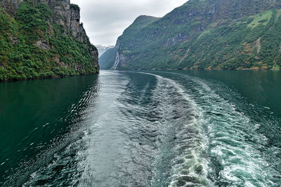 Scenic view of sea against mountain