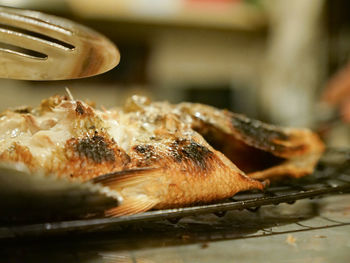 Fish grilled served and served with vegetables in the restaurant.