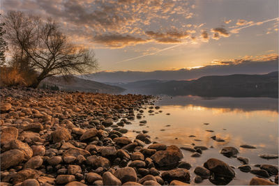 Scenic view of sea against sky during sunset