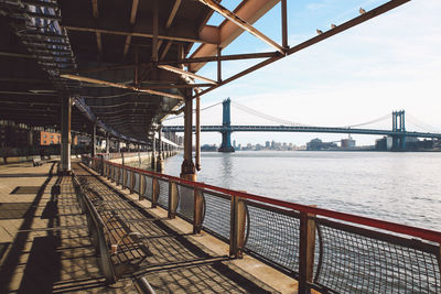 Bridge over city against sky