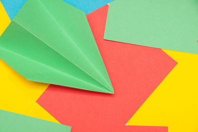 Close-up of origami on multi colored papers