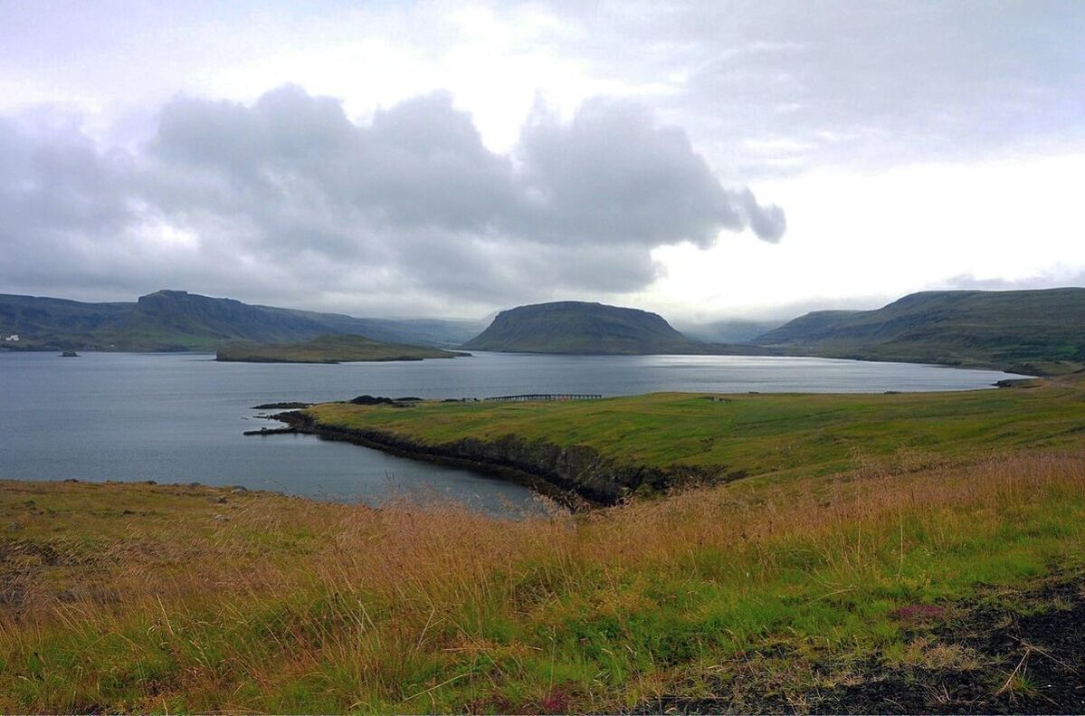 beauty in nature, grass, nature, tranquil scene, landscape, scenics, outdoors, no people, water, sky, day, tranquility, mountain