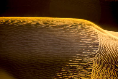 Aerial view of sea during sunset