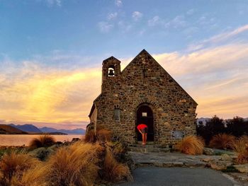 View of temple against sky during sunset