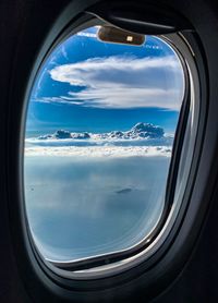 Sky seen through airplane window