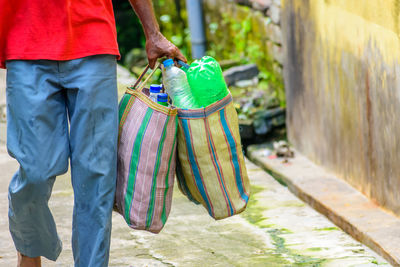 Plastic bottle are carrying out for recycling. stop using plastic. beat plastic pollution.