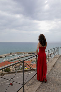 Rear view of woman looking at sea