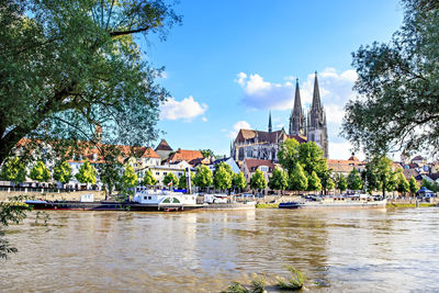 River against regensburg cathedral in city
