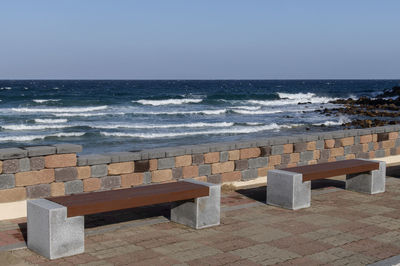 View of beach against clear sky
