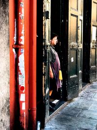 Man standing in front of building