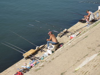 High angle view of people on boat in sea