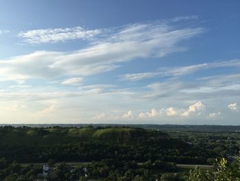 Scenic view of landscape against cloudy sky