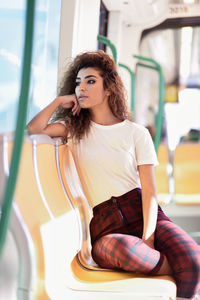 Young woman traveling in train