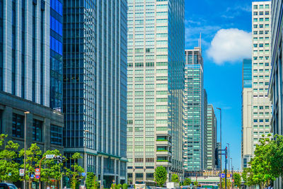 Low angle view of skyscrapers against sky