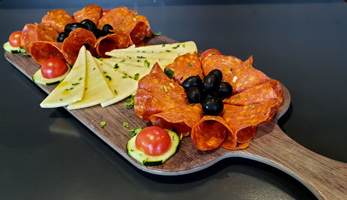 High angle view of fruits in plate on table