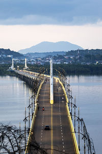 Pier over lake against sky