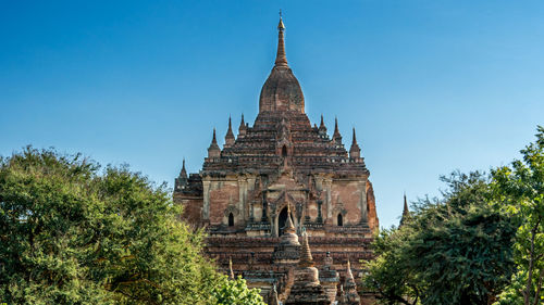 Low angle view of old buddhist temples against sky