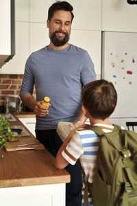 Portrait of young man working at home