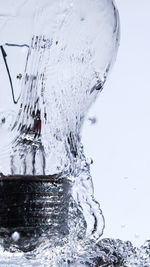 Person splashing water in winter