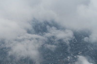 High angle view of buildings in city against sky