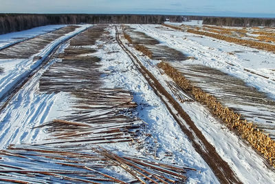 Snow covered land on field