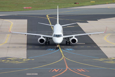 Airplane on airport runway
