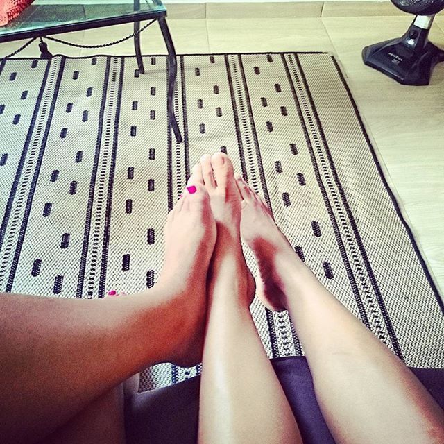 person, indoors, low section, personal perspective, lifestyles, barefoot, part of, human foot, legs crossed at ankle, relaxation, leisure activity, high angle view, sitting, human finger, cropped