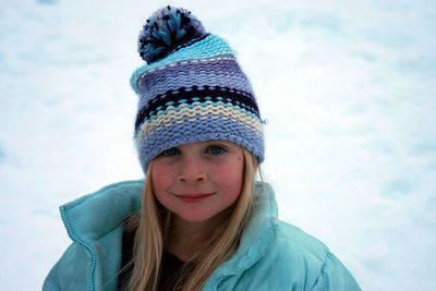 Portrait of cute girl wearing warm clothing