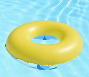 High angle view of yellow floating in swimming pool