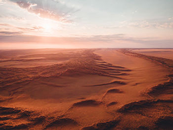 Scenic view of desert against sky