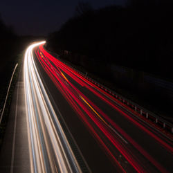 Light trails on highway at night