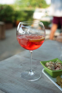 Close-up of wineglass on table