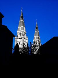 Low angle view of cathedral against blue sky