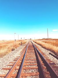 View of railroad tracks against clear sky