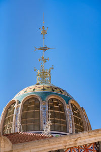 Detail of the central market of valencia against the sky