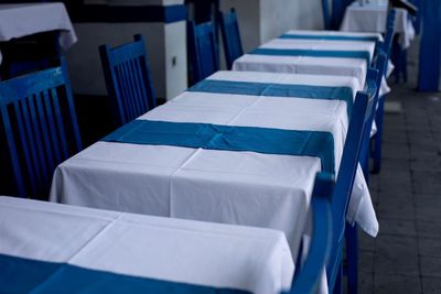 Close-up of empty chairs and table