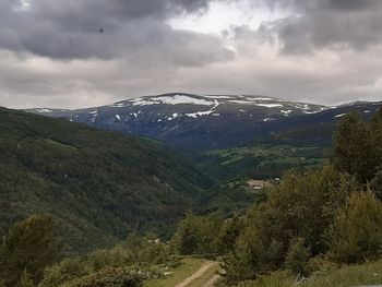 Scenic view of mountains against sky