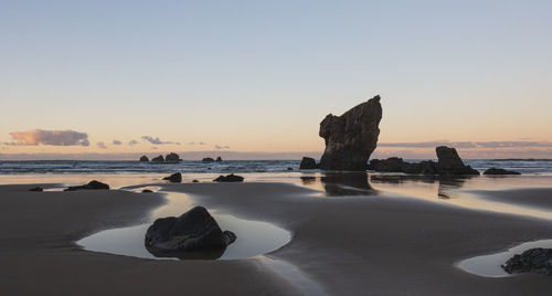 Lovely view of the rocks at low tide at the blue hour