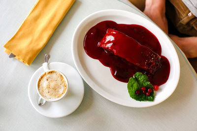 High angle view of food and coffee cup on table