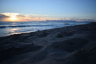 Scenic view of sea at sunset