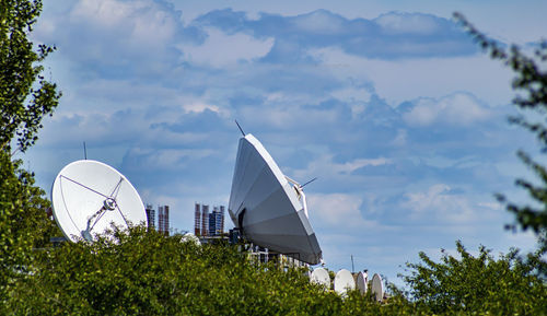 Large industrial satellite dishes for receiving and transmitting a signal.