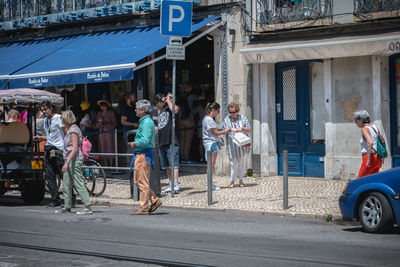 People on street in city