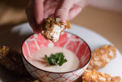 Close-up of hand holding food