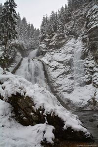 Scenic view of snow mountains against sky