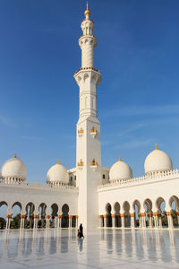 View of mosque against blue sky